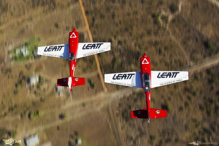 Two Marksmen Aerobatic Team aircraft flying in formation, air-to-air photograph by Frank Moody