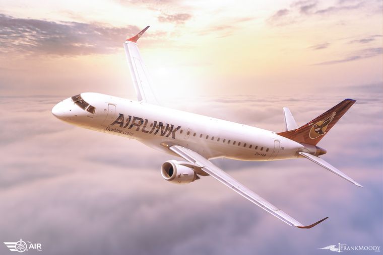 Airlink regional jet flying above the clouds, air-to-air photograph by Frank Moody